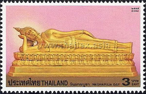 Buddha image in the pahng paang saiyaat pose