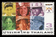 the logo of the 20th World Scout Jamboree and six faces of members of the international scouts movement from different regions and nationalities