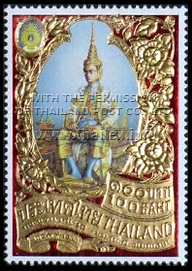 Gold stamp with picture of King Bhumipon Adunyadet's accession to the throne