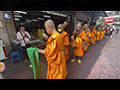 Buddhist Monks out on Thudong Shouldering a Klot-umbrella